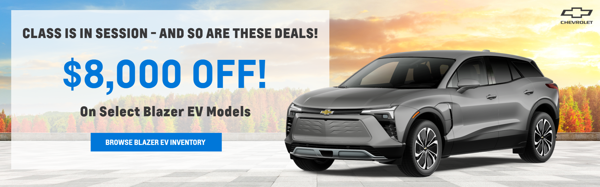 Grey Blazer EV in Fall with sunset in background